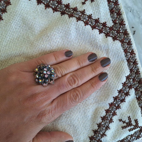 Bronze flower ring with pink rhinestones used