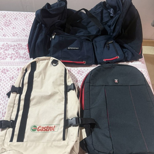 Set of 3 bags used, 1 50L duffel and 2 backpacks