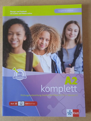 A2 Komplett Teacher's Book like new with printed solutions