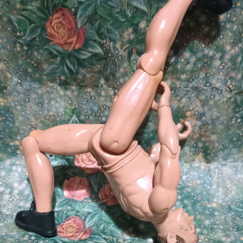 Plastic doll with movable limbs used