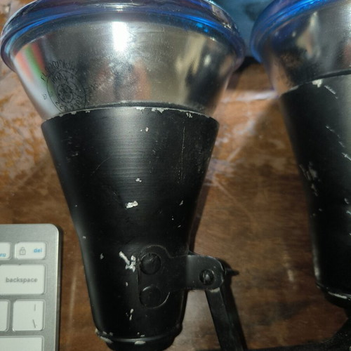 Iron spotlights with blue incandescent bulbs used, retro style