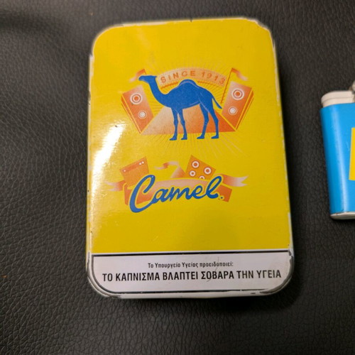 Camel box and lighter used with signs of wear