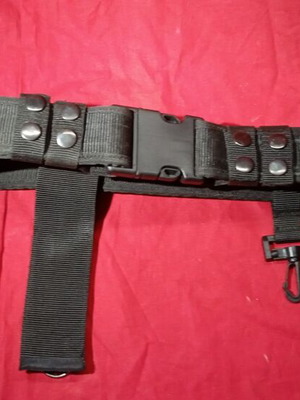 Tactical belt used, black cordura with quick-release buckle and holsters