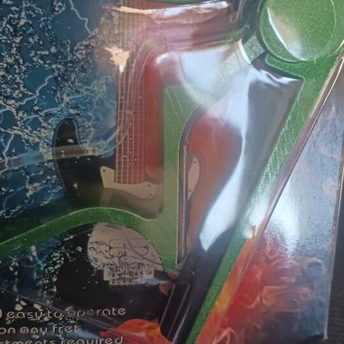 Green capo for acoustic guitar new