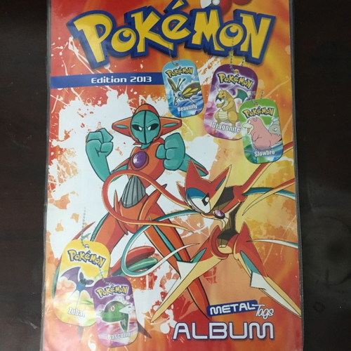 Pokémon album with metal tags used