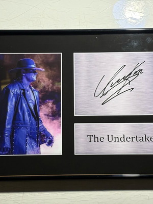 The Undertaker memorabilia poster new, signed WWE replica