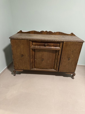 Vintage wooden buffet with carved details