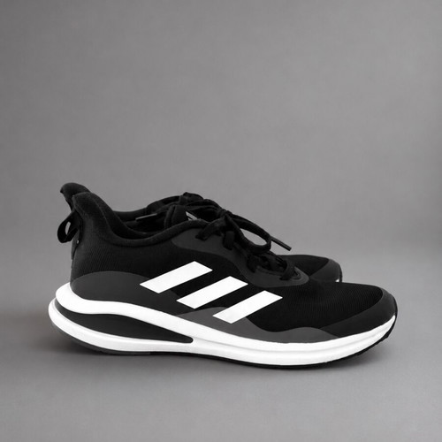 Adidas black athletic shoes with white details