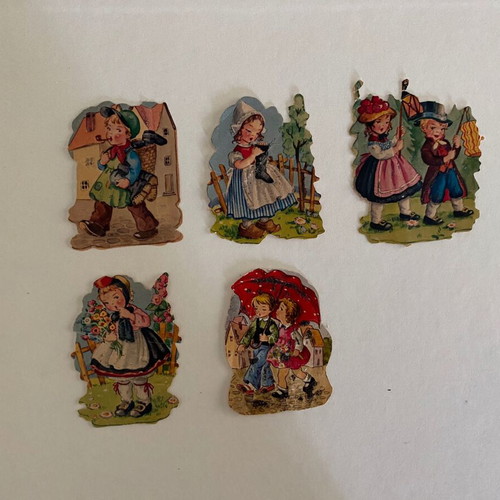 Vintage German embossed paper figures with children, used set of 5