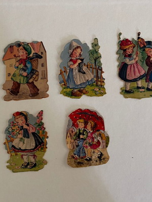 Vintage German embossed paper figures with children, used set of 5