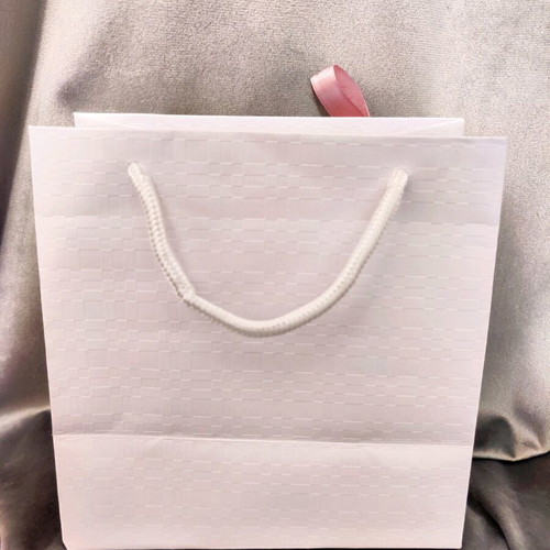 Gift bag with pink ribbon new