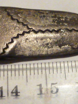 Antique silver tip of Revival belt used