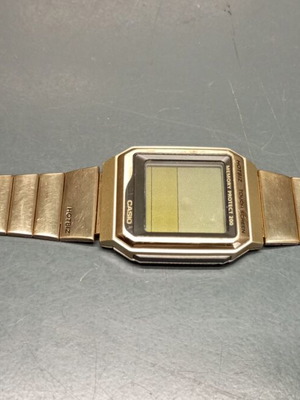 Casio VDB-2000 men's wristwatch used, gold color