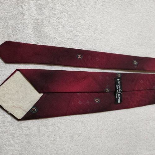 Red tie with patterns used