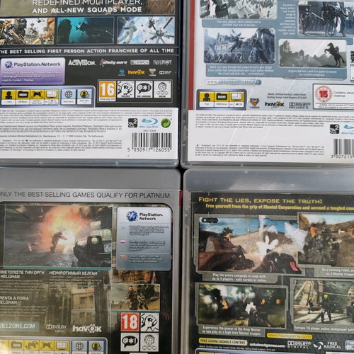 Pack of 4 used PS3 games: Haze, Call of Duty Ghosts, Killzone 2, Assassin's Creed