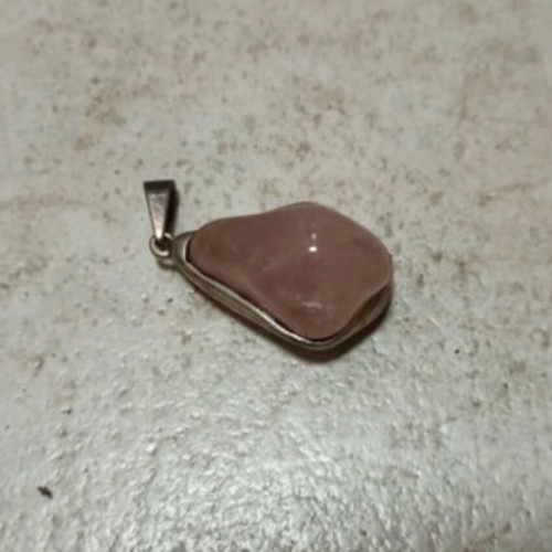 Silver pendant with large pink stone like new