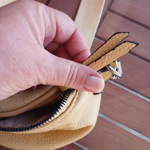 Yellow crossbody belt bag with adjustable strap