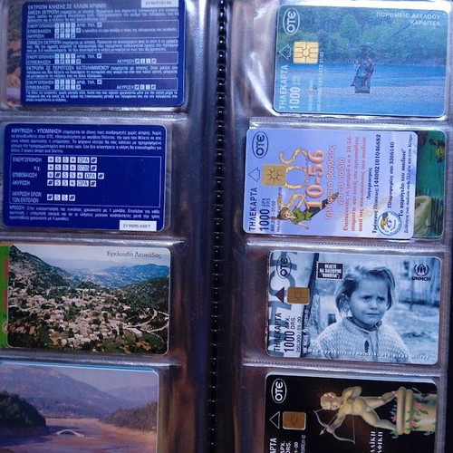 Phone cards like new, set of 48 in album 1
