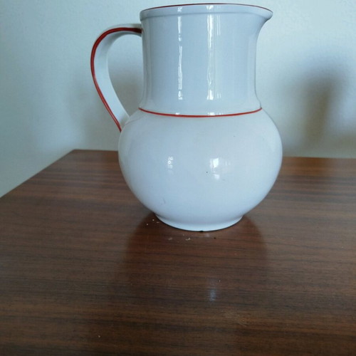 Faience jug used, white with fruit motif