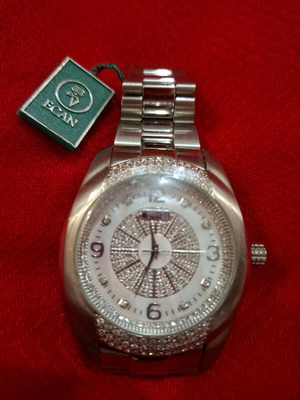 Ecan unisex watch new with zirconia, battery operated, white silver