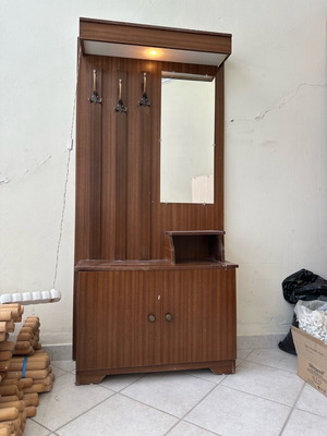 Vintage entrance furniture used with hooks, mirror and light