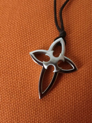 Pendant cross made of steel with cord in unique design like new