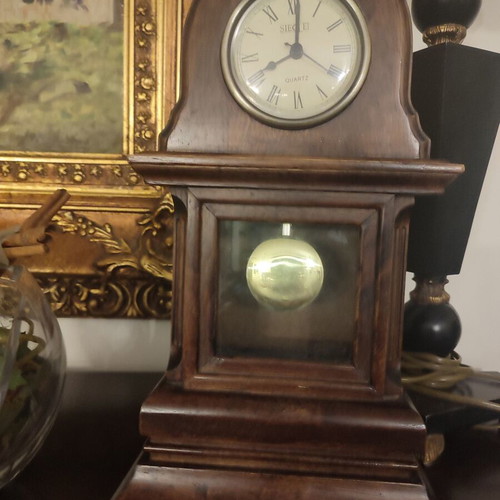 Wooden table clock with pendulum used, analog