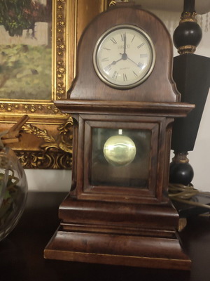 Wooden table clock with pendulum used, analog