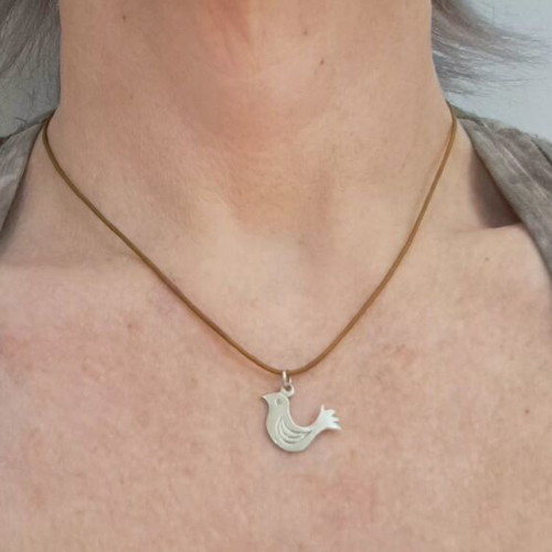 Vally Kontidis Silver Bird Necklace on Ecru Cord like new