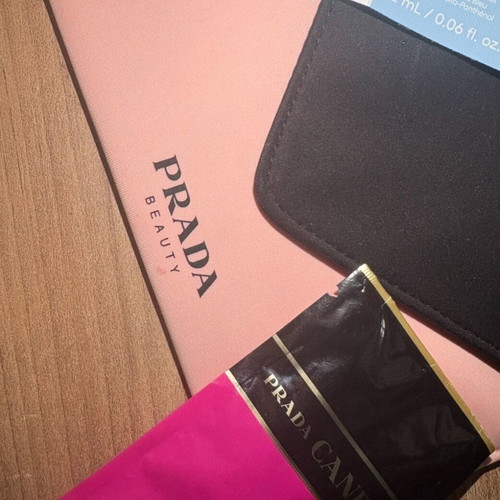 Prada toiletry bag like new with Candy perfume and Laneige product
