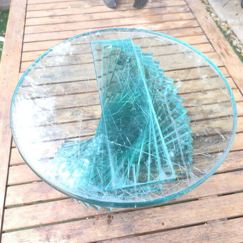 Round coffee table used with glass spiral base