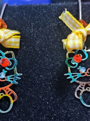 Earrings with cat design like new, multicolored