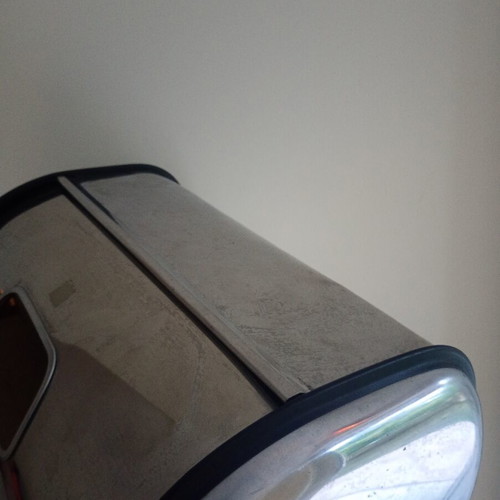 Metal bread box with two dents