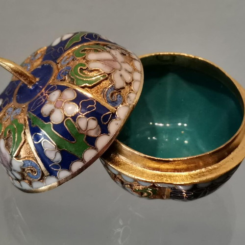 Cloisonne decorative pumpkin used with floral motifs
