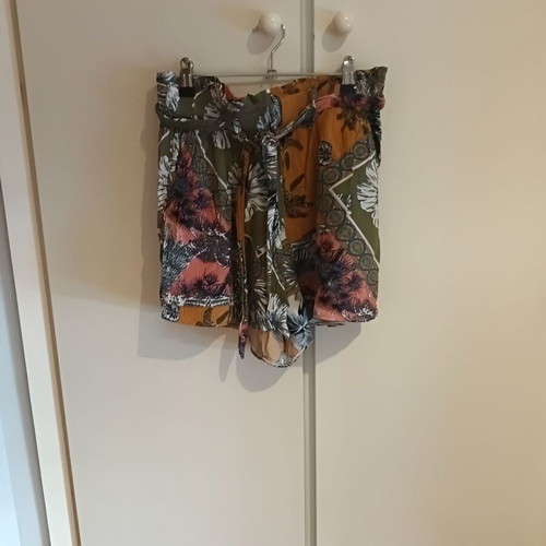 Printed shorts used, A-line with elastic waist and pockets