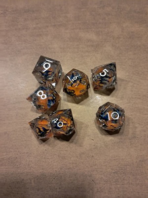 Liquid core D&D dice set with blue dragon design