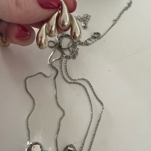 Jewelry set used with 2 necklaces and earrings