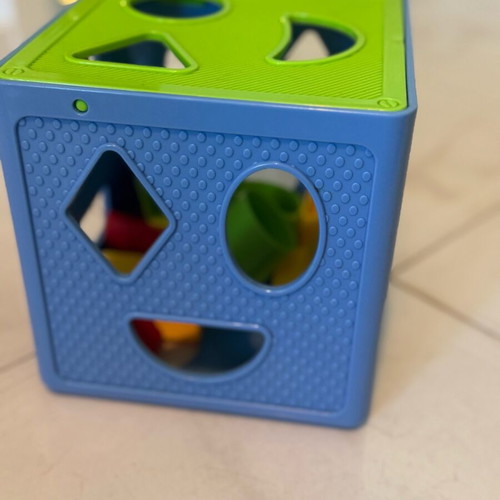 Shape sorting cube like new with blue and green colors