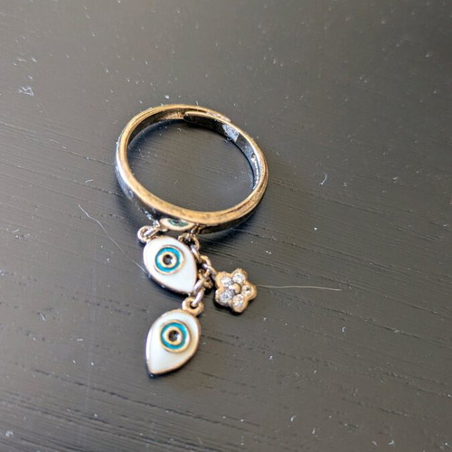 Silver ring gold plated with evil eyes like new