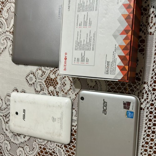 Tablet pack of four used for spare parts
