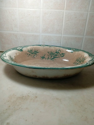 Vintage oval serving dish used with green floral decoration