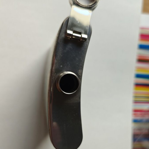 Vintage metal flask "Adventure Is Out There" with world map design