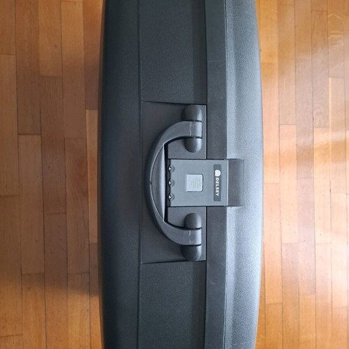 Delsey hard suitcase used, large, black with 2 wheels