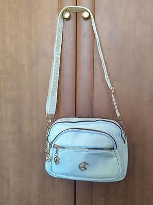 White crossbody bag with multiple pockets