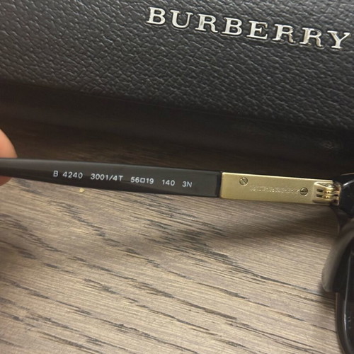 Burberry sunglasses like new, black and gold