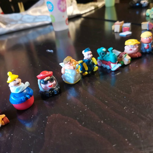 Vintage collection of 41+ used Kinder Surprise toys
