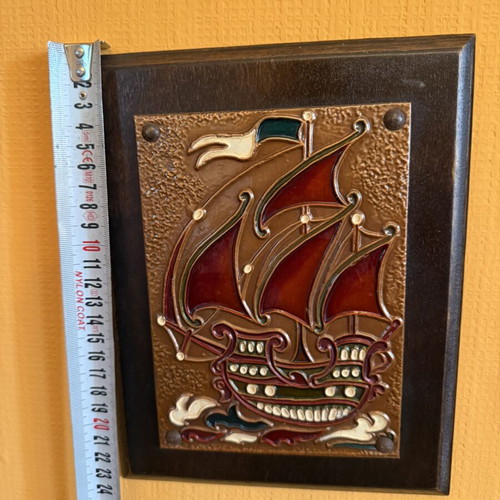 Embossed copper decorative ship on wooden base like new