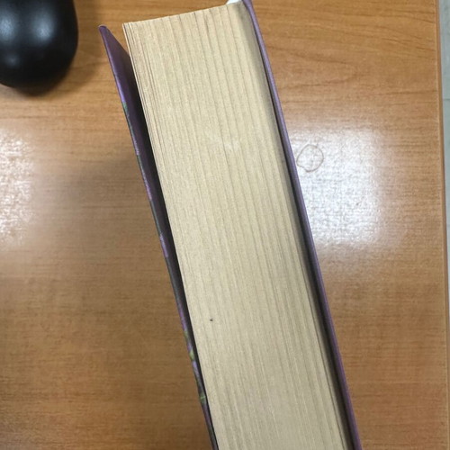 The 13 Curses used Greek book