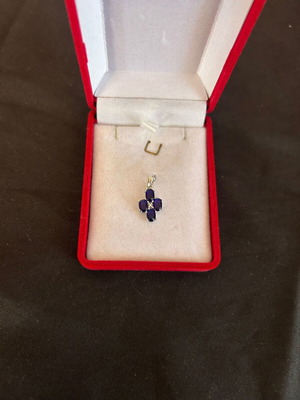 Silver cross with purple stones like new
