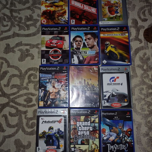 PlayStation 2 used with 12 games without controllers